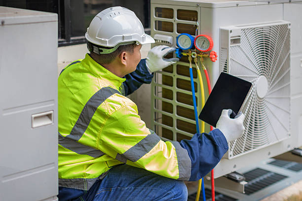 Professional Hvac Maintenance technician working in Harrisonville, MO
